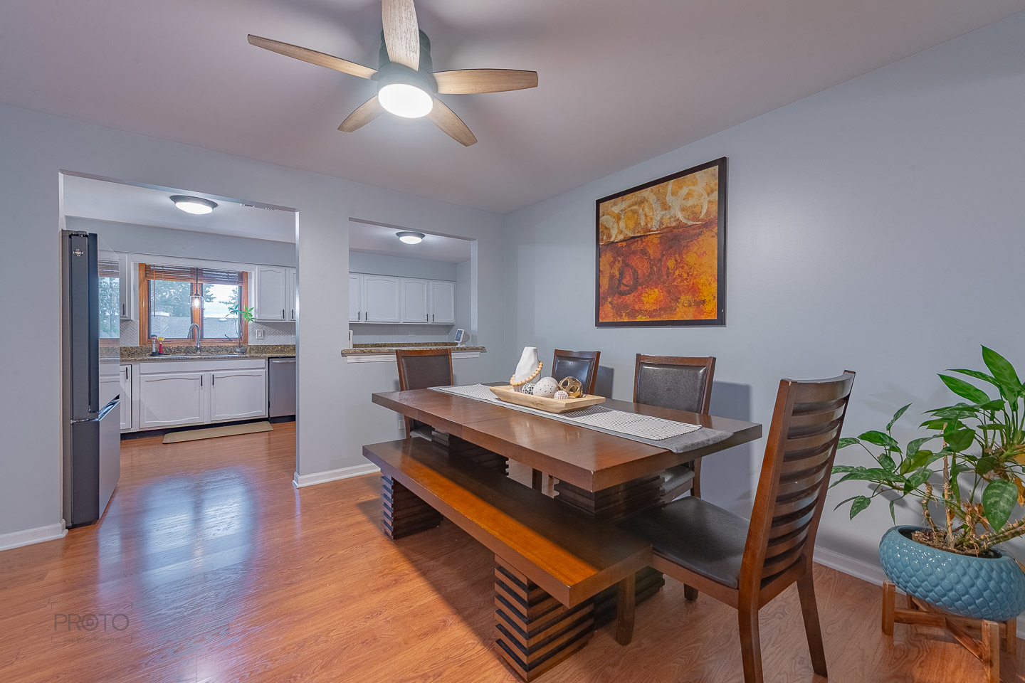 11015 South 84th Avenue, Unit 3C Palos Hills, IL 60465 - Photo 11 of 30 a view of a dining room with furniture window and wooden floor