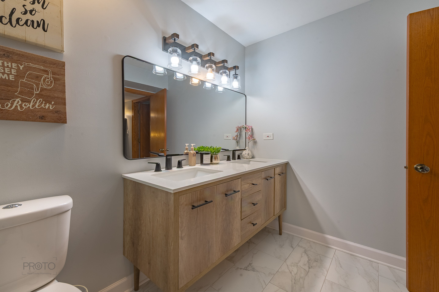 11015 South 84th Avenue, Unit 3C Palos Hills, IL 60465 - Photo 15 of 30 a bathroom with a toilet sink and mirror