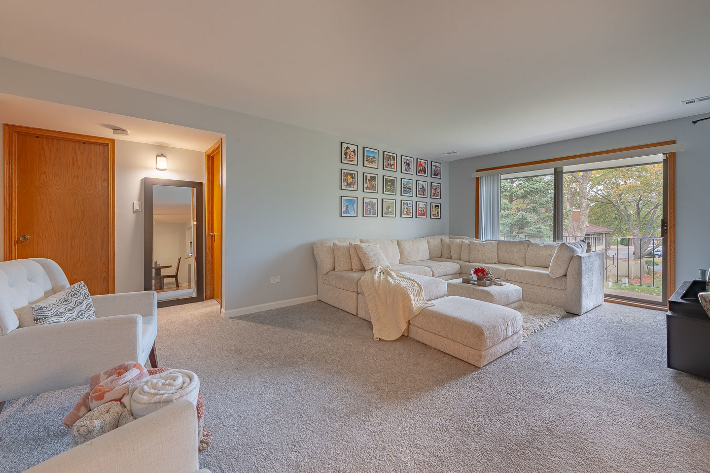 11015 South 84th Avenue, Unit 3C Palos Hills, IL 60465 - Photo 2 of 30 a living room with furniture and large windows