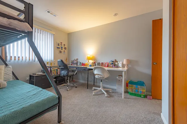 a room with furniture and a wooden floor