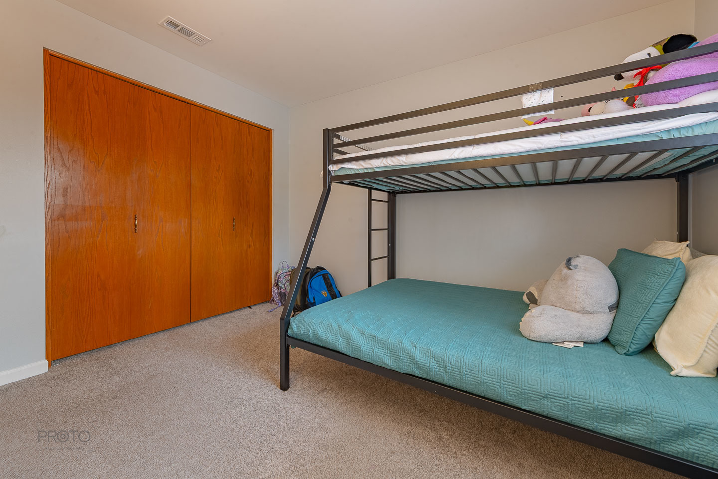 11015 South 84th Avenue, Unit 3C Palos Hills, IL 60465 - Photo 24 of 30 a room with a bed and wooden floor