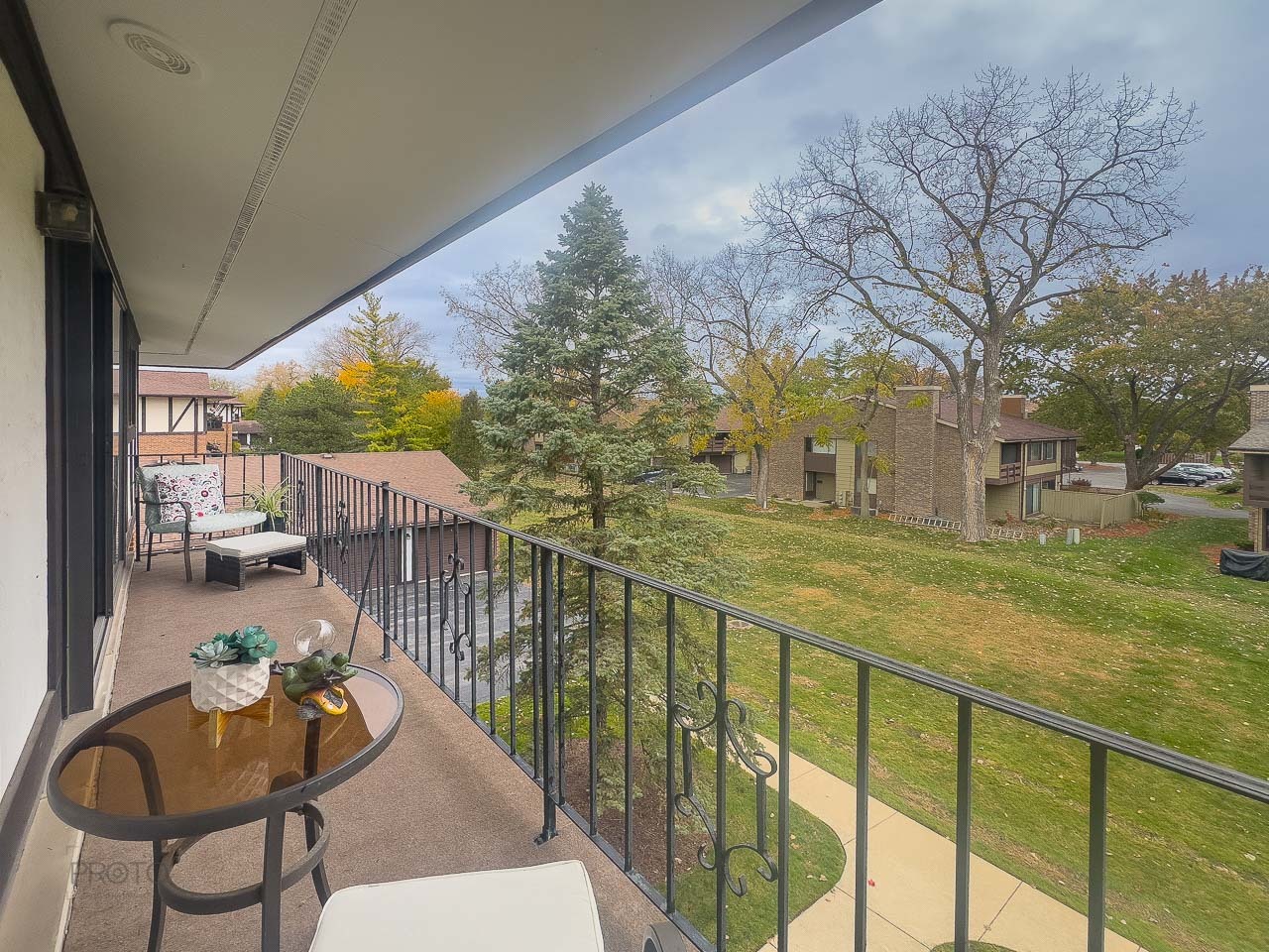 11015 South 84th Avenue, Unit 3C Palos Hills, IL 60465 - Photo 27 of 30 a view of a patio with iron fence