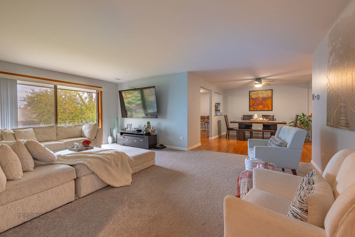 11015 South 84th Avenue, Unit 3C Palos Hills, IL 60465 - Photo 3 of 30 a living room with furniture and a large window