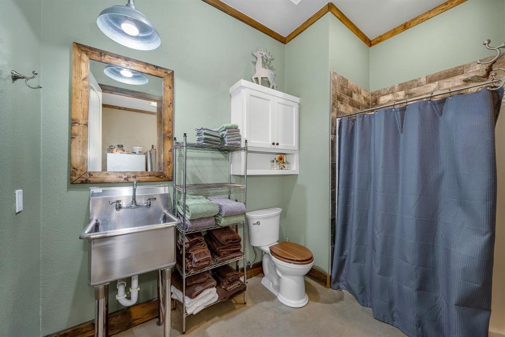 650 Scoggins Road Tioga, TX 76271 - Photo 29 of 32 shop bathroom