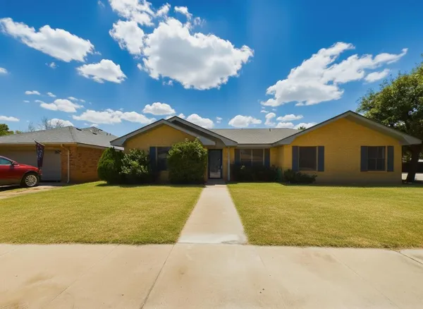 a house view with a backyard space