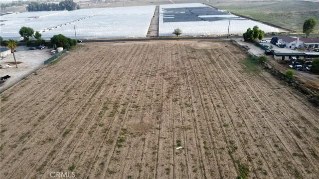 a view of a backyard of the house