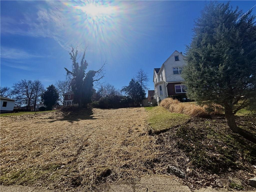 904 6th Avenue Coraopolis, PA 15108 - Photo 2 of 3 a view of a yard with a house