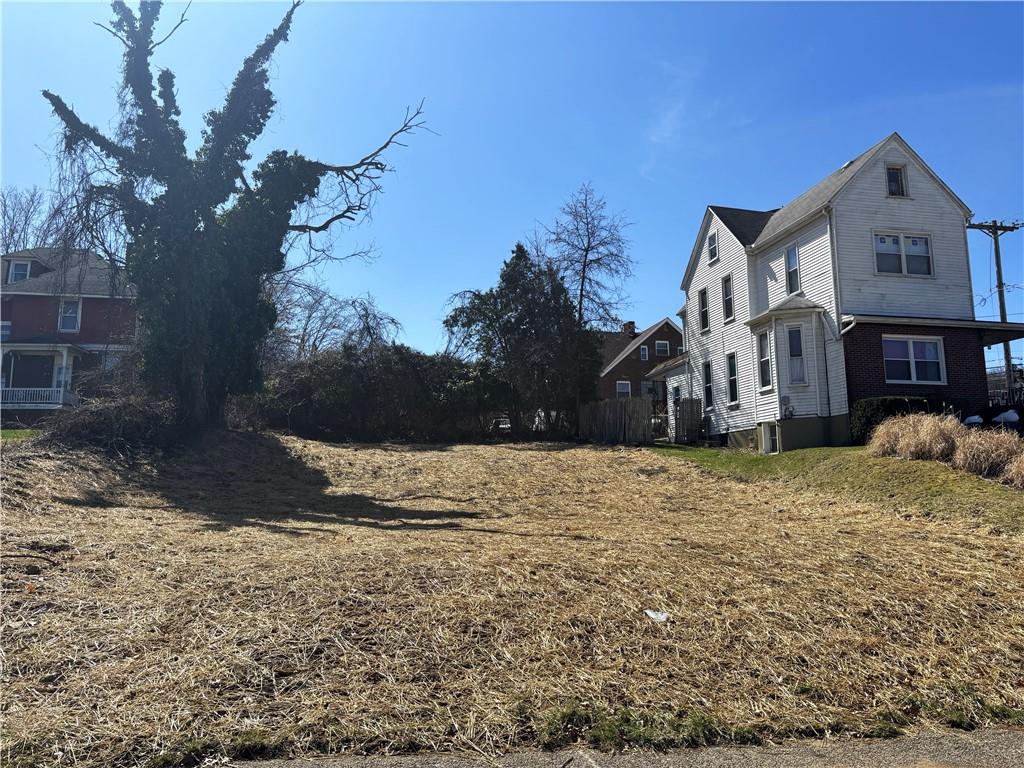 904 6th Avenue Coraopolis, PA 15108 - Photo 3 of 3 a front view of a house with a yard