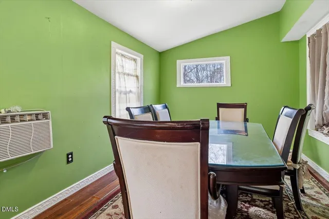 a work room with furniture and a window