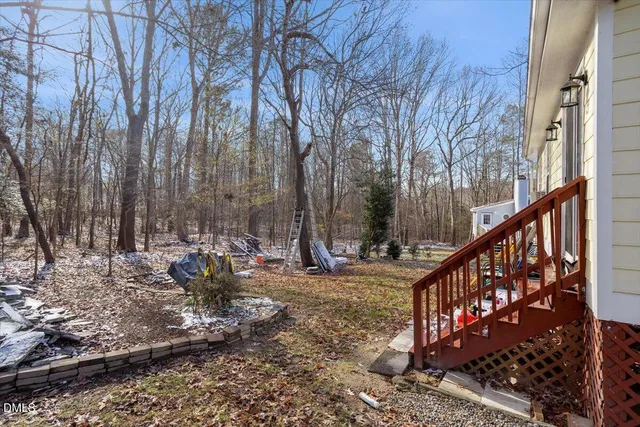 a view of a deck with trees