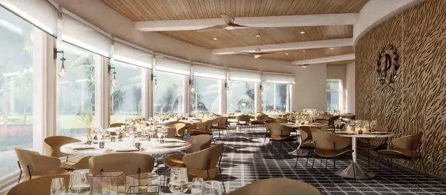 a room with lots of white furniture and windows