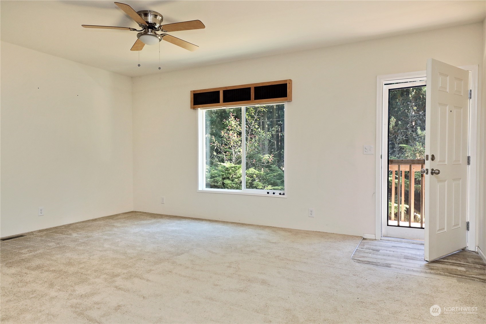 2811 East Andreason Road Langley, WA 98260 - Photo 12 of 38 an empty room with windows and closet