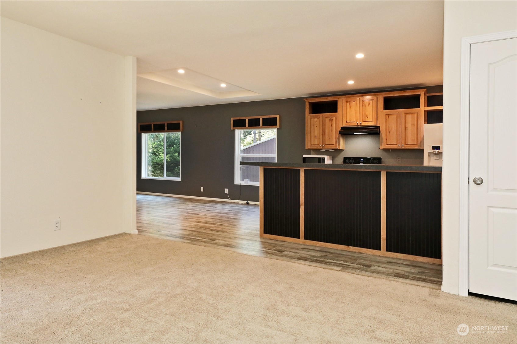2811 East Andreason Road Langley, WA 98260 - Photo 13 of 38 a view of kitchen with kitchen island microwave and stove top oven