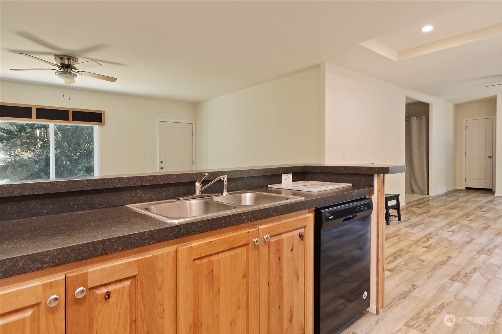 2811 East Andreason Road Langley, WA 98260 - Photo 18 of 38 a kitchen with a sink and a window