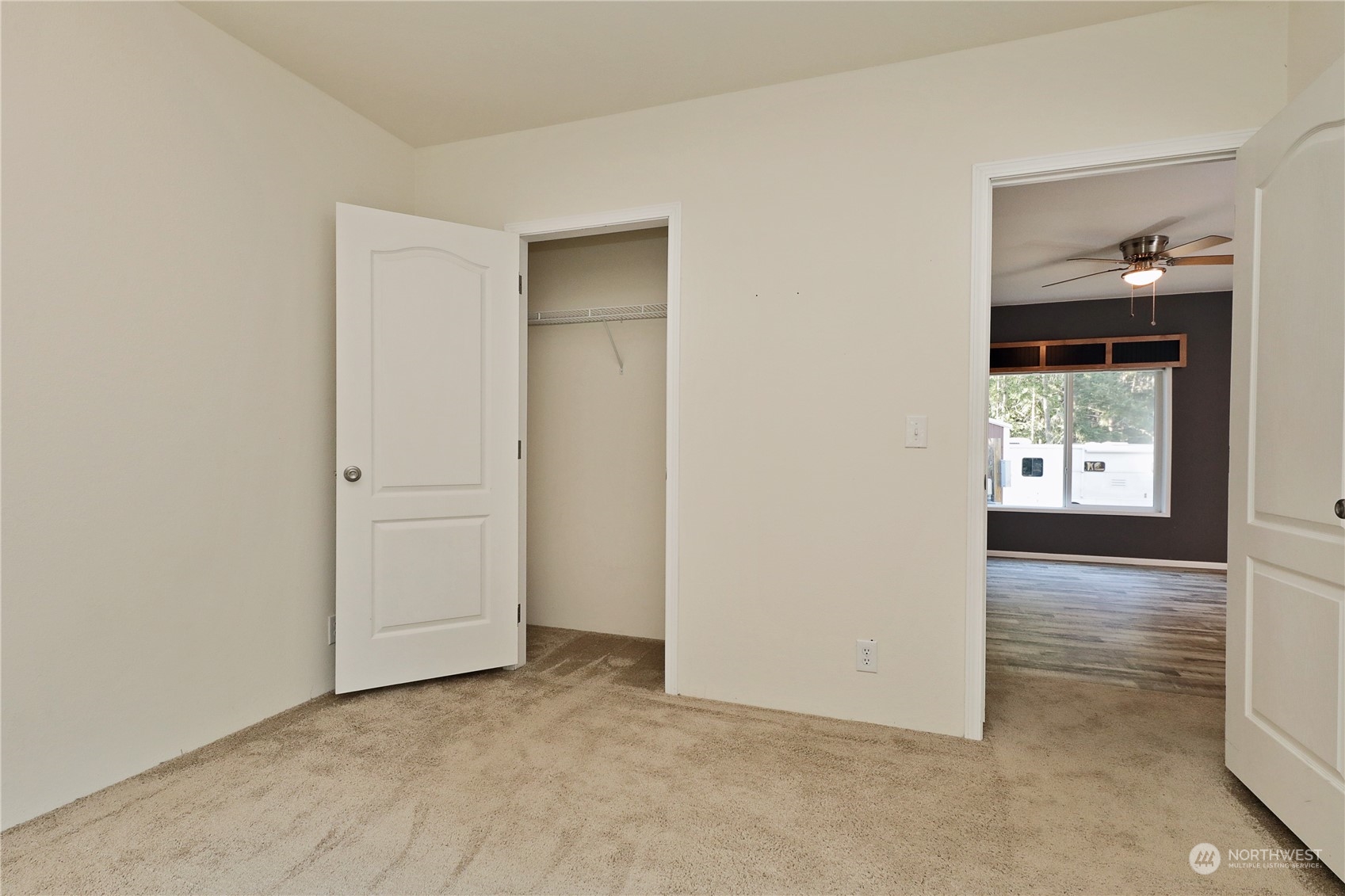 2811 East Andreason Road Langley, WA 98260 - Photo 26 of 38 an empty room with windows and closet