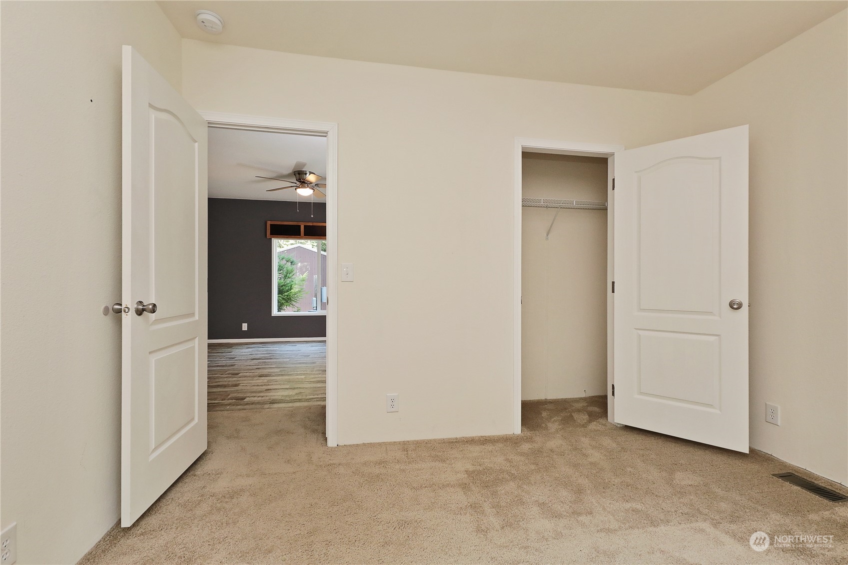 2811 East Andreason Road Langley, WA 98260 - Photo 30 of 38 an empty room with windows and closet