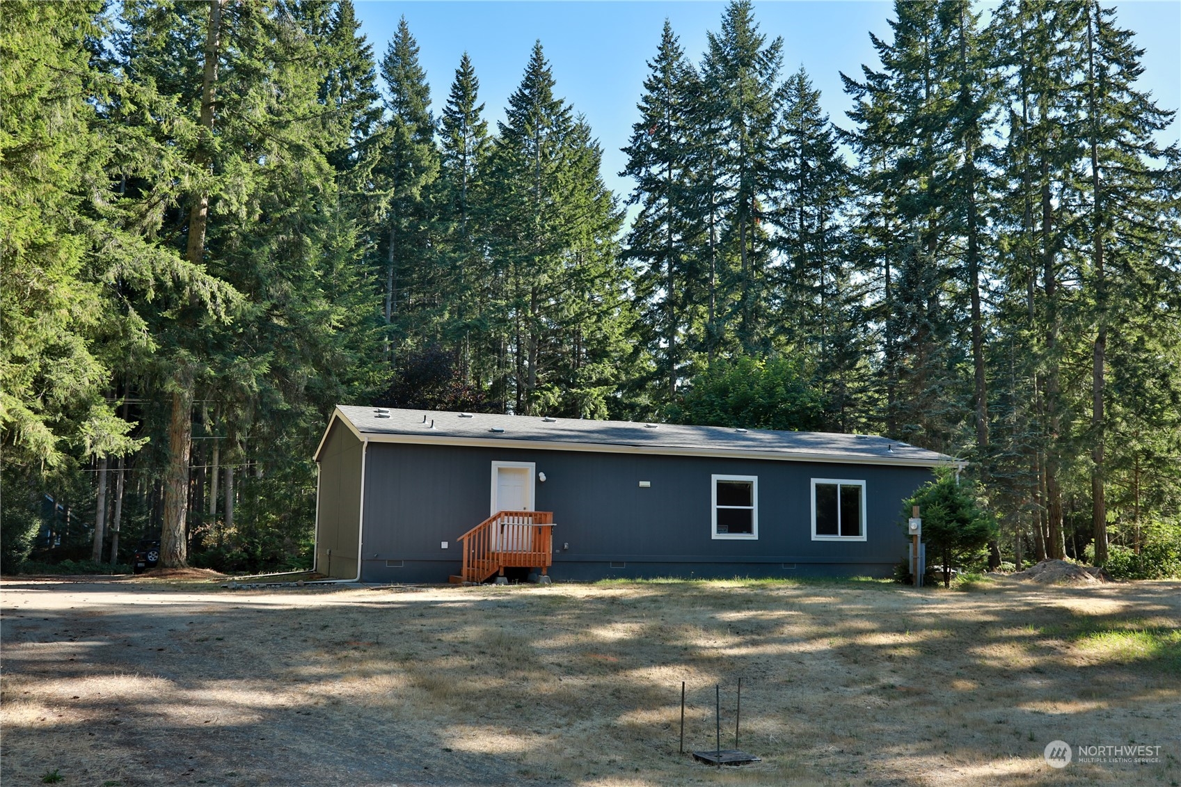 2811 East Andreason Road Langley, WA 98260 - Photo 5 of 38 a view of a house with a yard