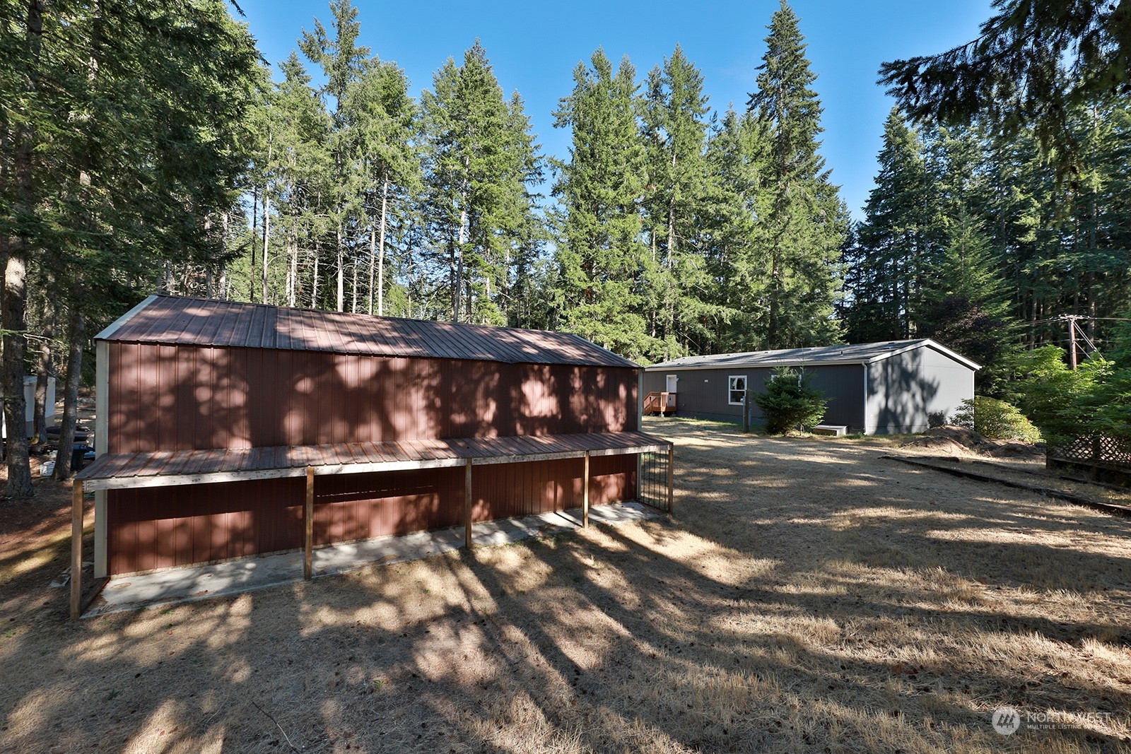 2811 East Andreason Road Langley, WA 98260 - Photo 7 of 38 a view of a house with a yard