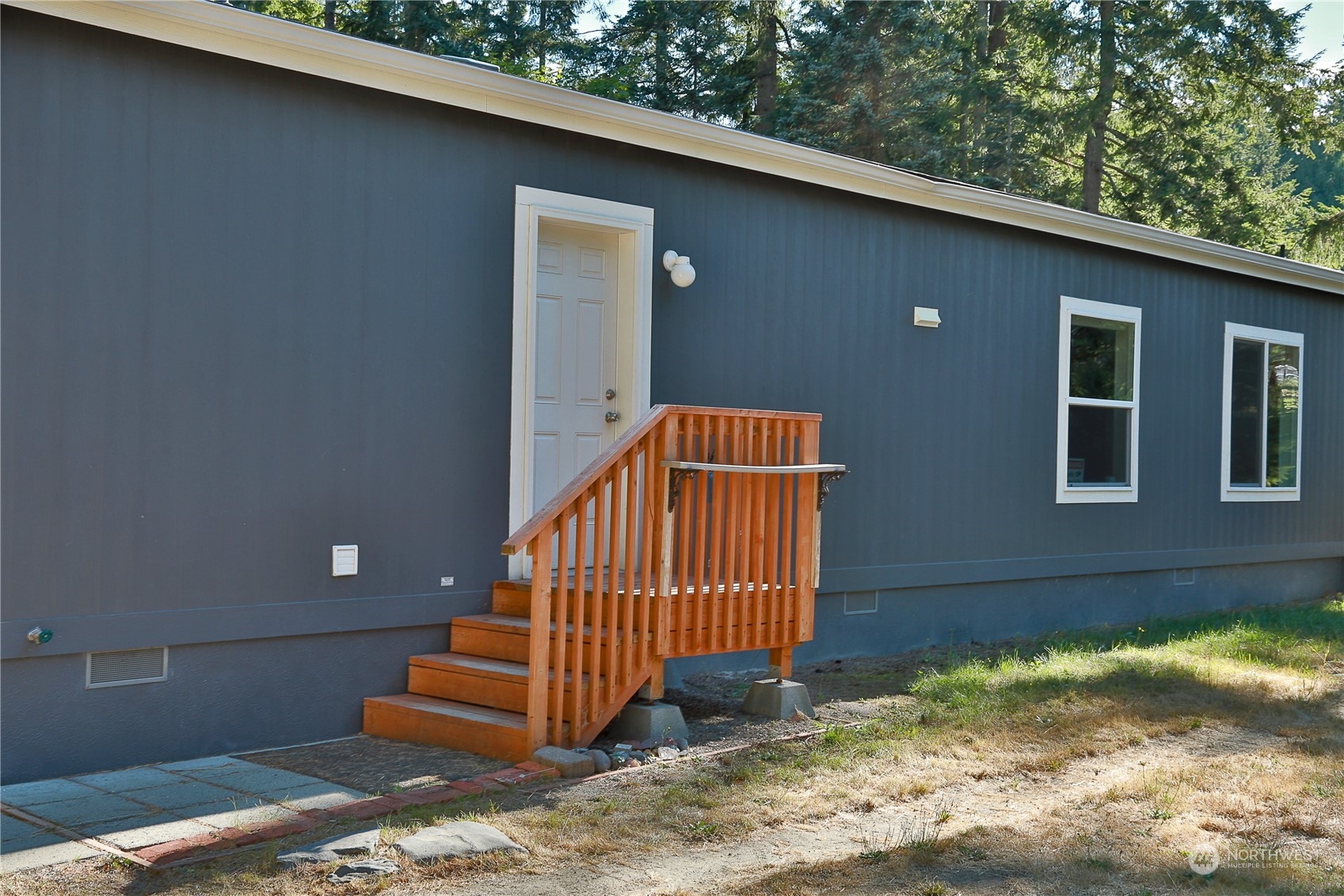 2811 East Andreason Road Langley, WA 98260 - Photo 10 of 38 a view of a small yard from a balcony
