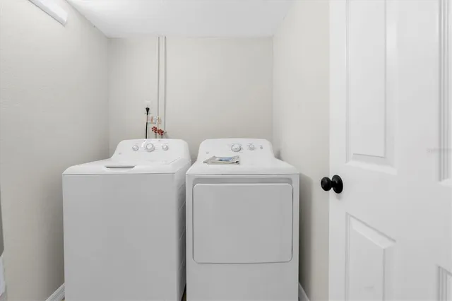 a utility room with dryer and washer