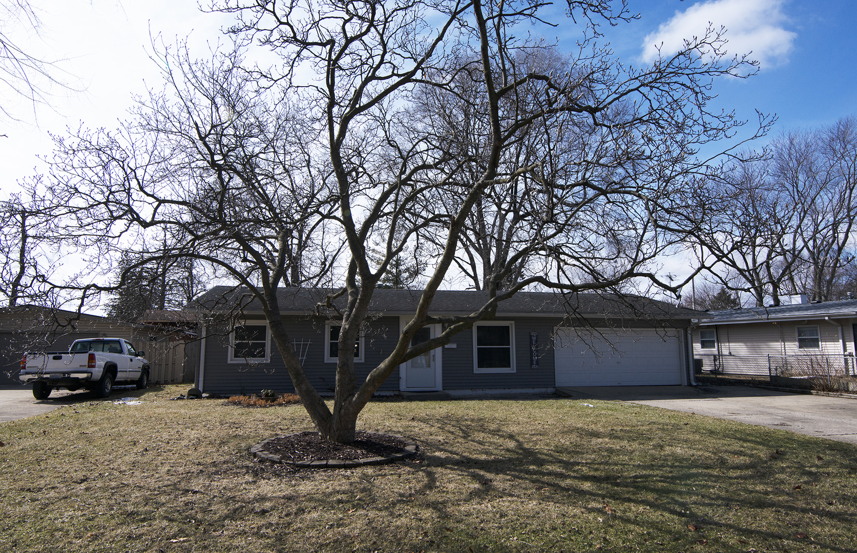 37 Durango Road Montgomery, IL 60538 - Photo 2 of 27 a front view of a house with a yard and garage
