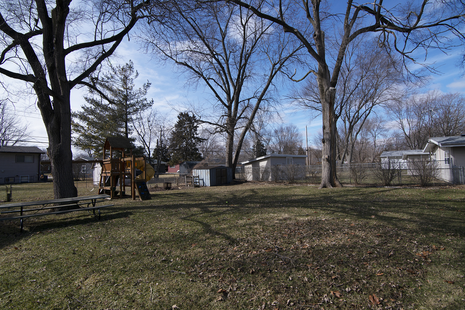 37 Durango Road Montgomery, IL 60538 - Photo 25 of 27 a backyard of a house with large trees
