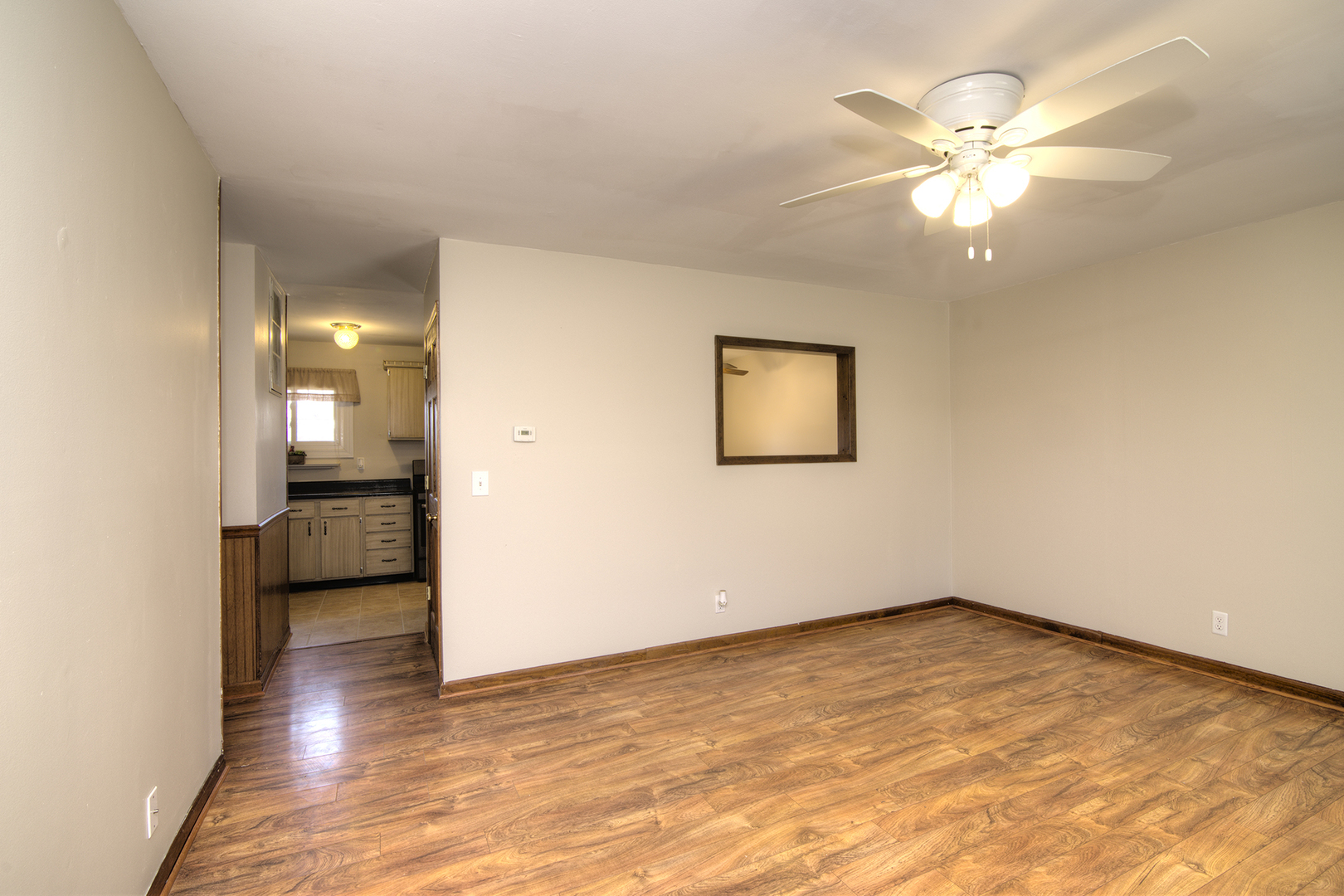 37 Durango Road Montgomery, IL 60538 - Photo 7 of 27 wooden floor in an empty room and a bathroom