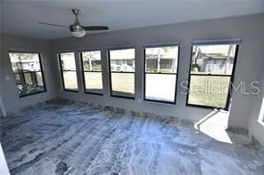 en empty room with windows