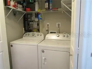 a bathroom with a shower and sink