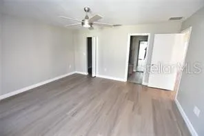 a view of bathroom with a sink and a mirror