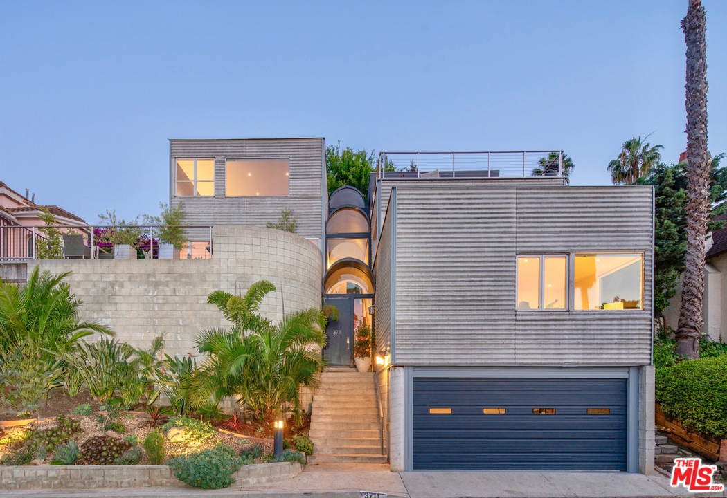 3711 Prestwick Drive Los Angeles, CA 90027 - Photo 36 of 37 a front view of a house with a yard