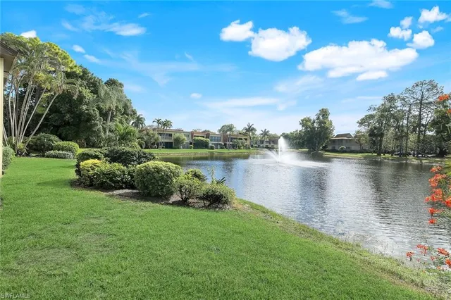 a view of a lake with a big yard