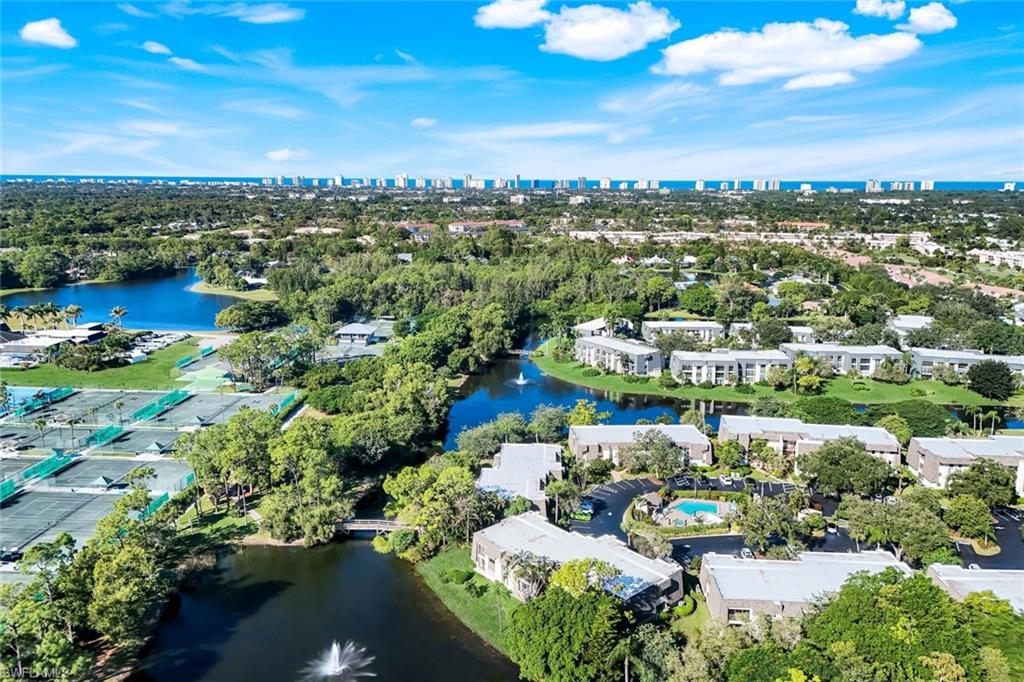 1672 Spoonbill Lane, Unit B Naples, FL 34105 - Photo 27 of 41 a view of a city