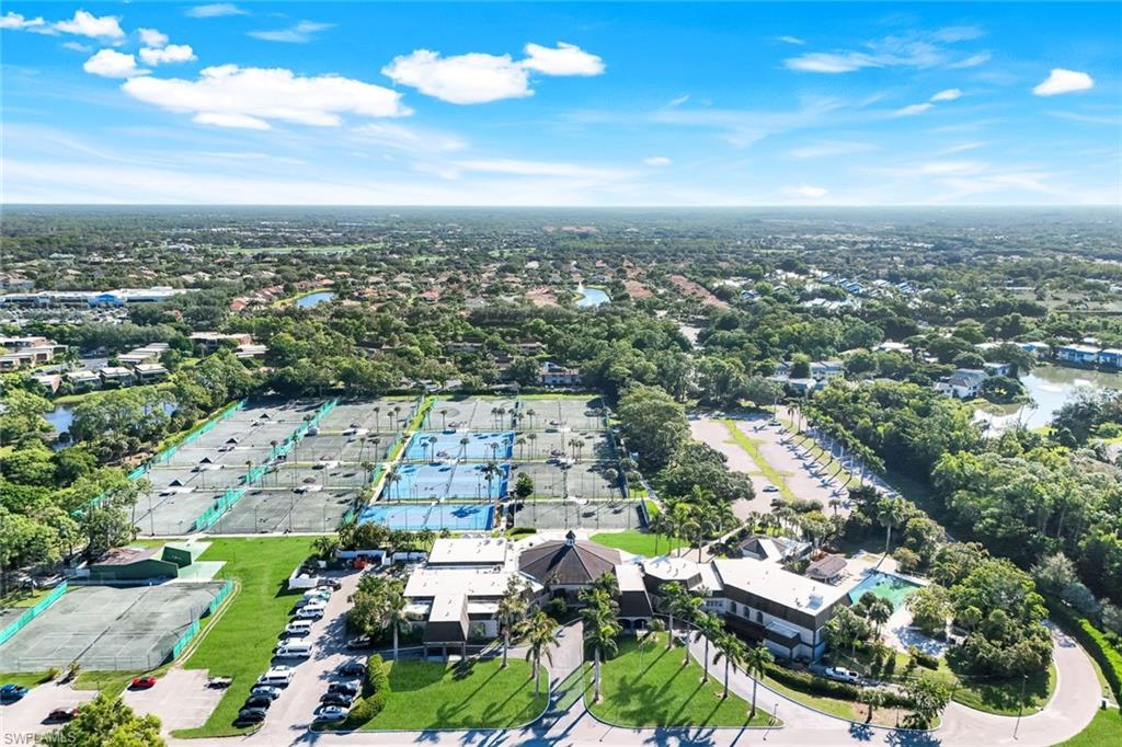 1672 Spoonbill Lane, Unit B Naples, FL 34105 - Photo 33 of 41 an aerial view of multiple house