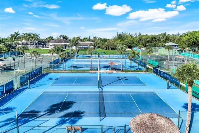 a view of a table and chairs in the terrace