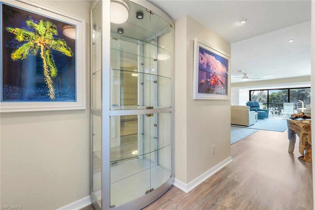 1672 Spoonbill Lane, Unit B Naples, FL 34105 - Photo 4 of 41 a view of a hallway with dining area