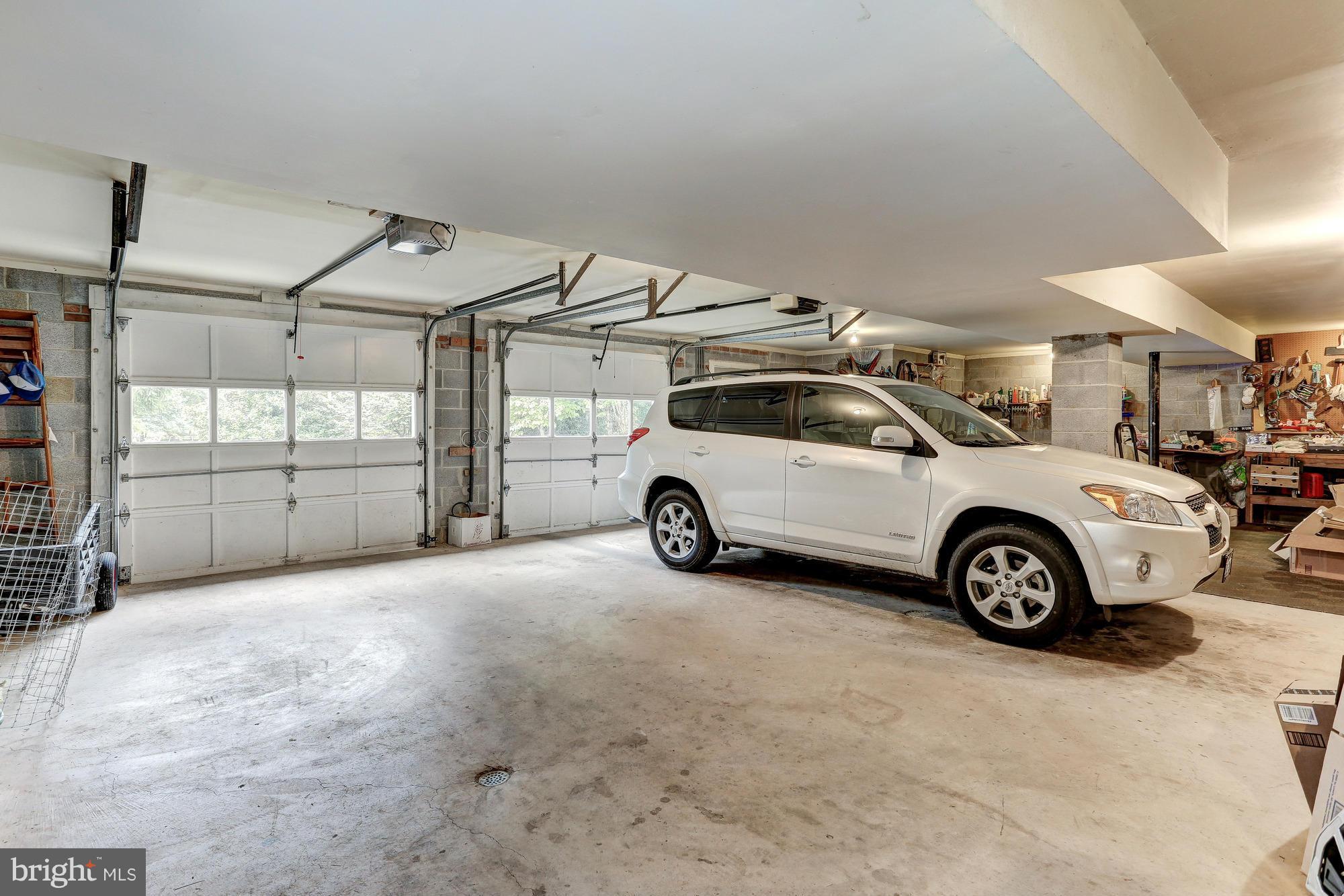 238 Hunters Road Washington, VA 22747 - Photo 23 of 30 Huge garage fits 2 cars, workshop and riding mower