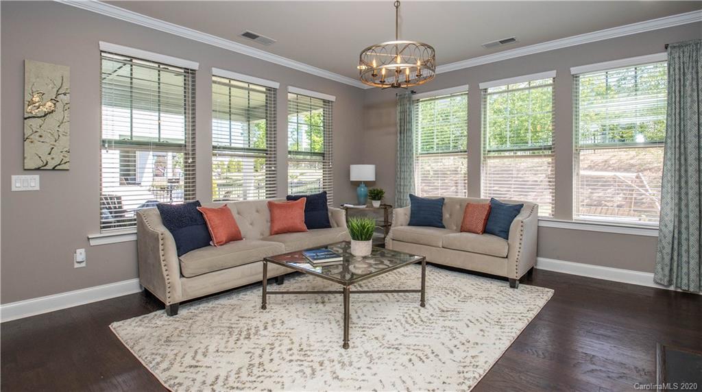1026 Emory Lane Fort Mill, SC 29708 - Photo 11 of 41 a living room with furniture and a chandelier