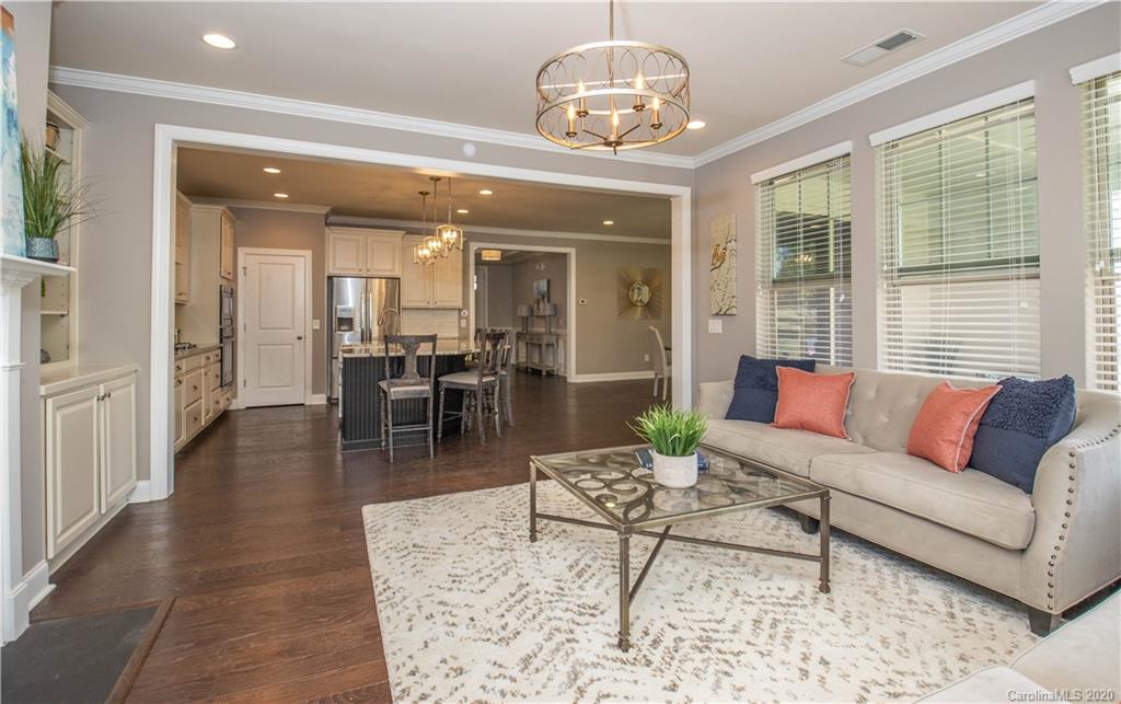 1026 Emory Lane Fort Mill, SC 29708 - Photo 12 of 41 a living room with furniture chandelier and a chandelier