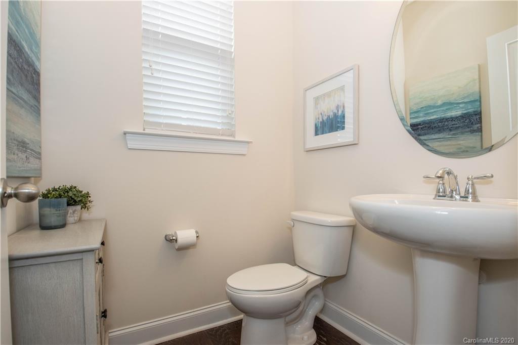 1026 Emory Lane Fort Mill, SC 29708 - Photo 14 of 41 a bathroom with a toilet sink and mirror