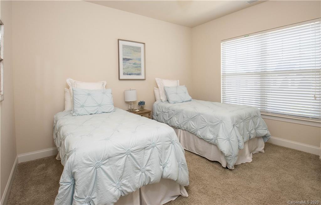 1026 Emory Lane Fort Mill, SC 29708 - Photo 19 of 41 a bedroom with two beds and a window