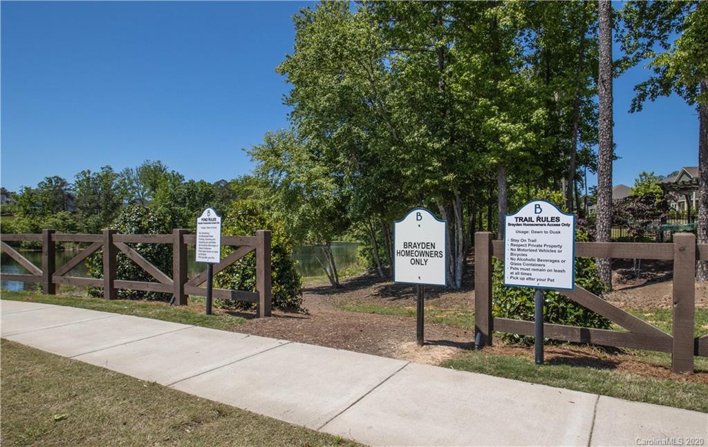 1026 Emory Lane Fort Mill, SC 29708 - Photo 38 of 41 a sign board with a wooden fence