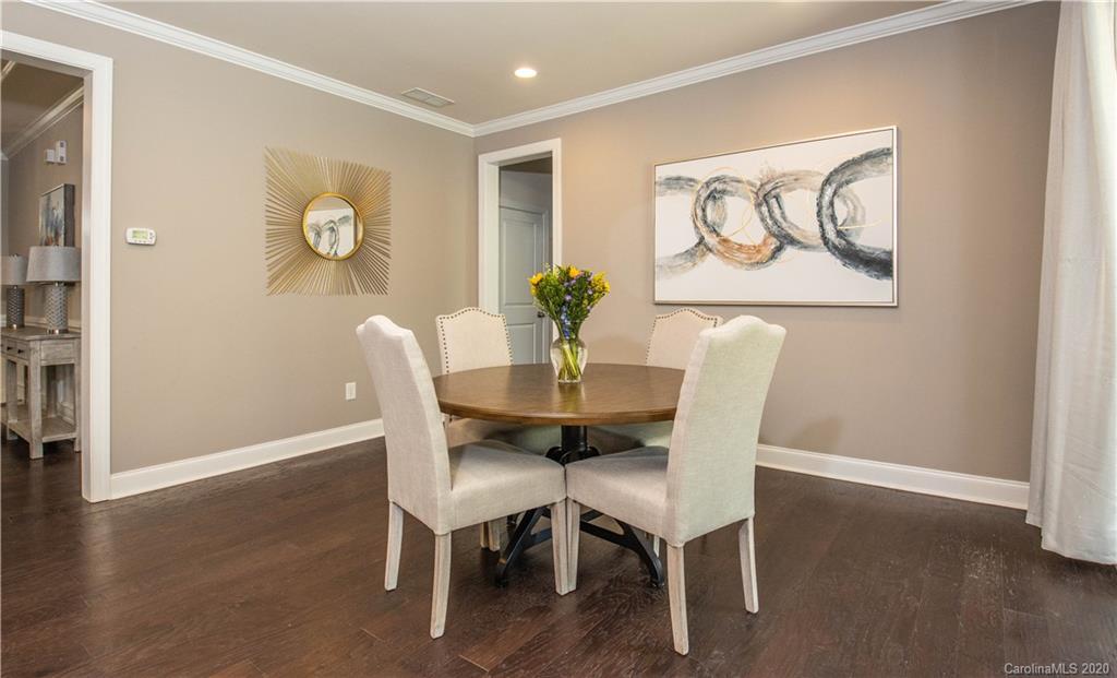 1026 Emory Lane Fort Mill, SC 29708 - Photo 5 of 41 a dining room with furniture and wooden floor