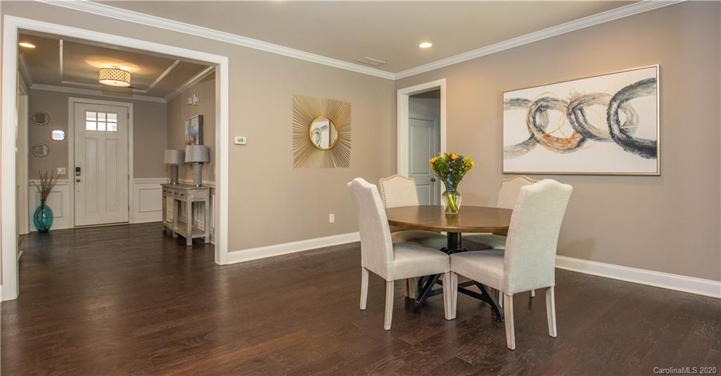 1026 Emory Lane Fort Mill, SC 29708 - Photo 6 of 41 a view of a dining room with furniture and wooden floor