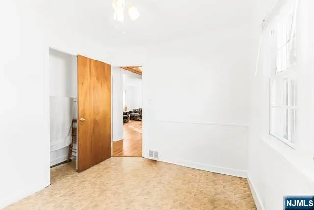 a view of house with wooden floor