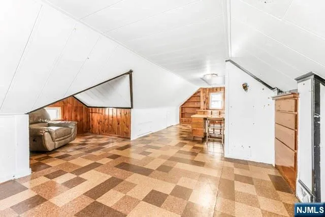 a kitchen with a stove and a refrigerator