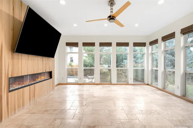 a view of an empty room with windows