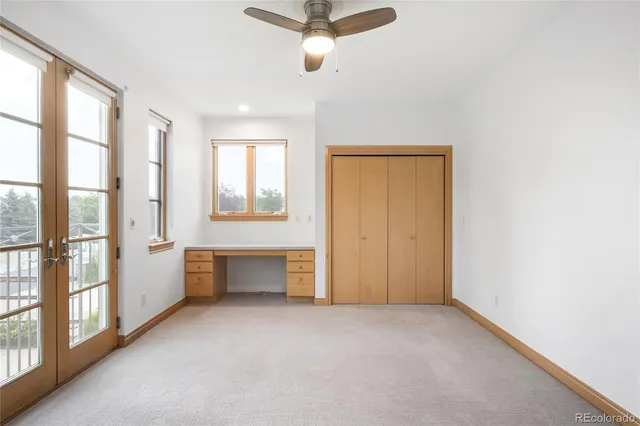 a view of a room with a large window