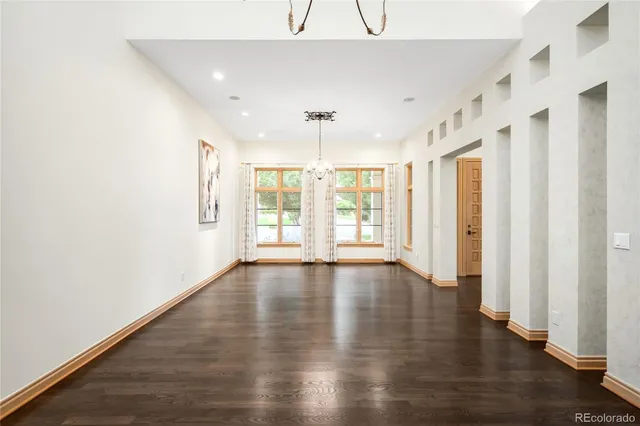 a view of a livingroom with wooden floor