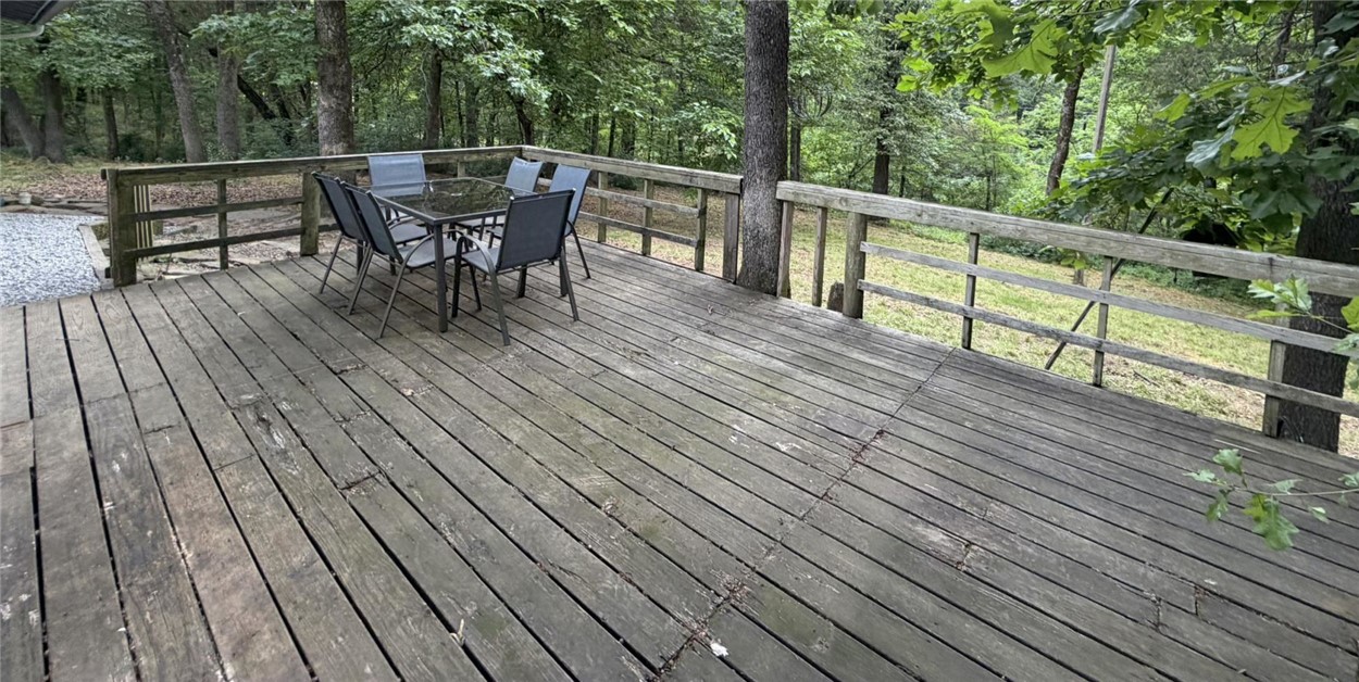 5108 Ridge Road Alma, AR 72921 - Photo 30 of 33 Spacious outdoor deck featuring wooden planking and a perimeter railing